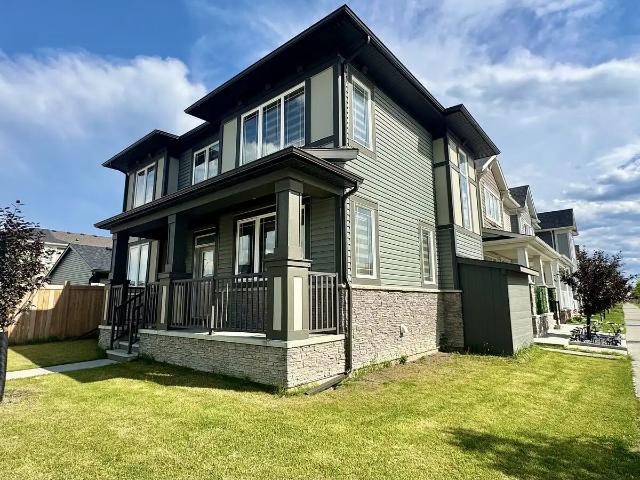 Spacious 3 Bedroom Main Floor Home with Double Garage & Large Fenced Backyard