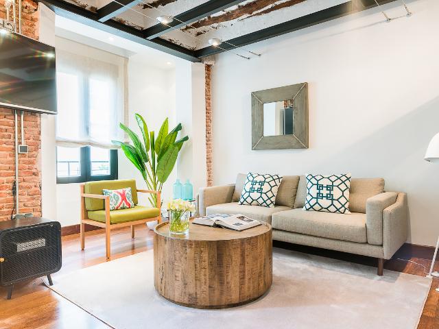 Spacious Two Bedroom Apartment with Stylish Exposed Brick