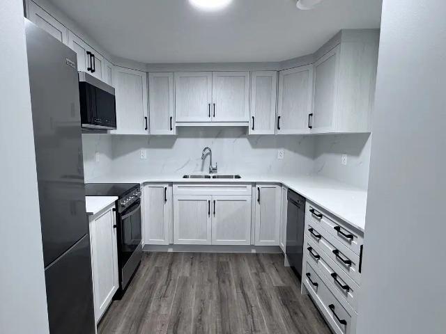 Spacious and modern 2 bed/2bath legal basement suite