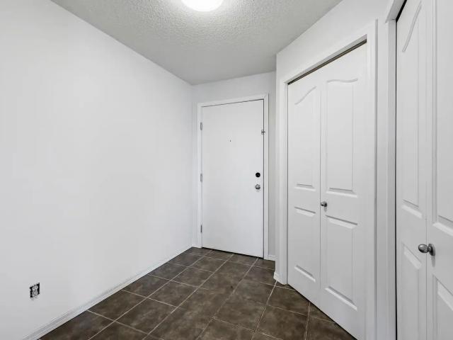 Spacious Corner Unit in McKenzie Towne – 2 Bed | 2 Bath | underground parking