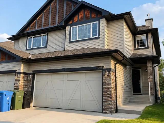 Spacious Duplex with Walk Out Basement in Springbank Hills
