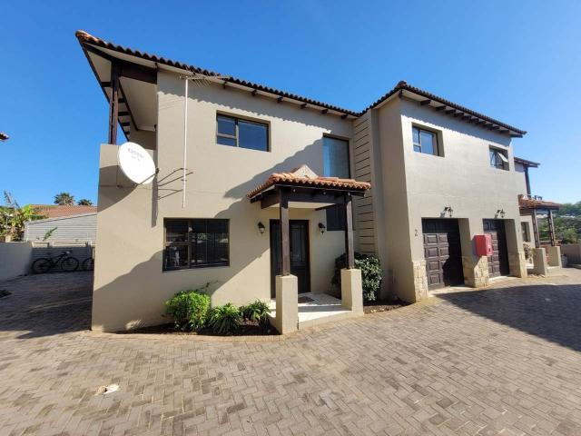 Spacious duplex townhouse in sought after security complex