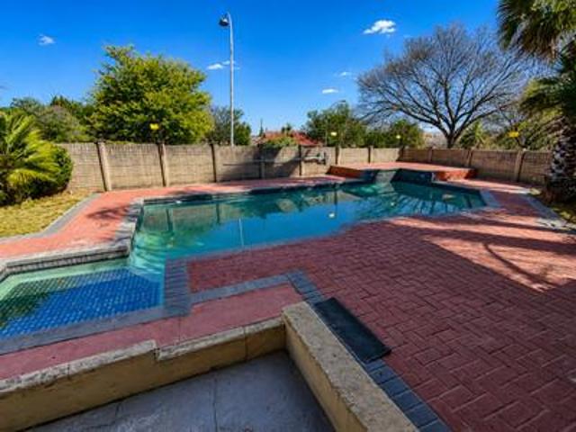 spacious family home with a swimming.