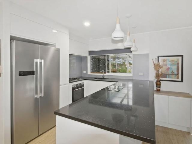 Spacious family home with exceptional indoor outdoor living!