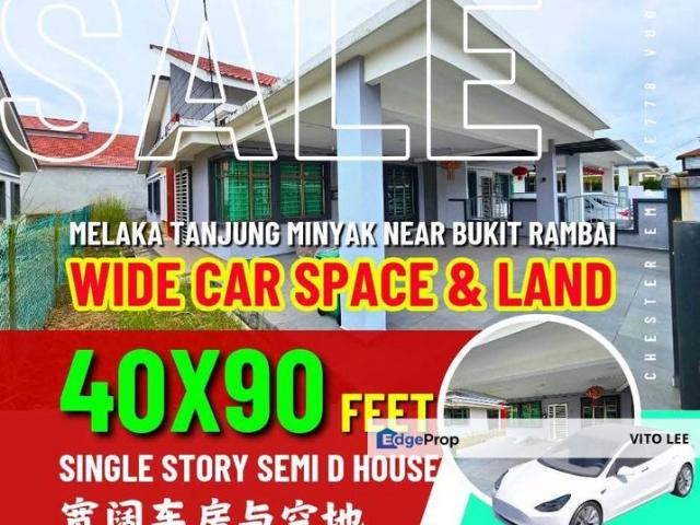 Spacious garage and vacant land. Single story semi d house for sale