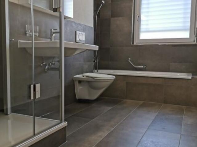 Spacious ground floor apartment with modern finishing standard in Herrenschwanden