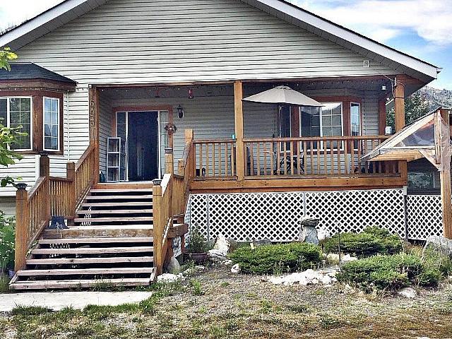 Spacious Home On Small Acreage With Workshop!