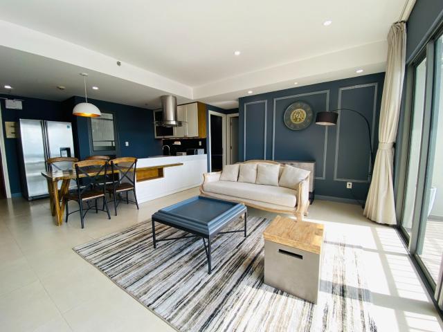 Spacious living room connect to balcony with city view and kitchen area. Full furnished with beautiful interior