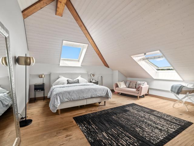 Spacious penthouse in a modern residence in the center of Founex | dreamo. Ch