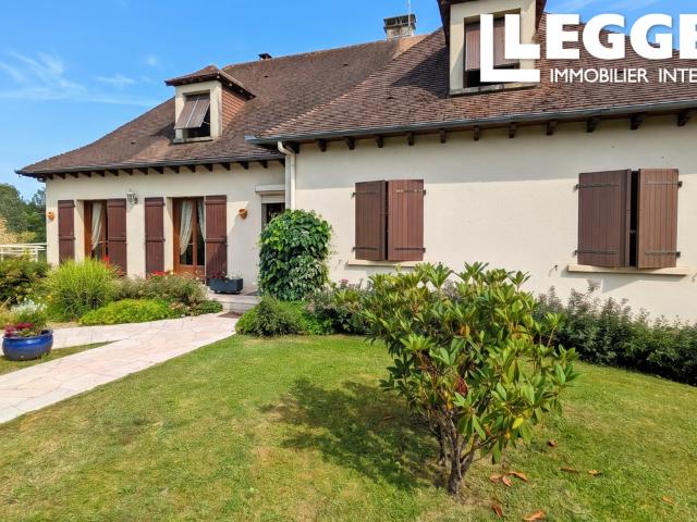 Spacieuse maison familiale de 4 chambres avec sous sol complet, véranda et jardin à Lubersac