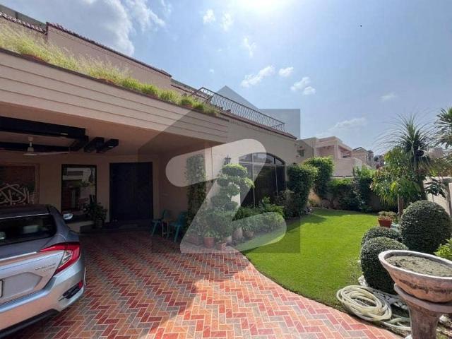 Spanish design 1 kanal elegant and fully maintained super hot located bungalow is available in the best block of dha lahore