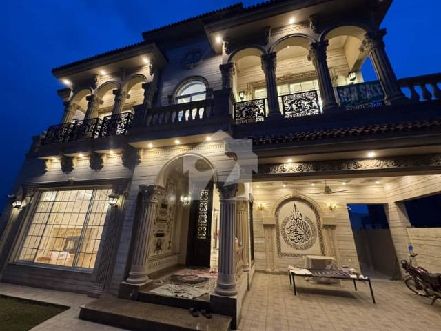 Spanish Inspired 2 Kanal Luxury Mansion For Sale In DHA Phase 6 Featuring One Kanal Elegant Living Space & One Kanal Lush Green Lawn, Easy Deal Opportunity By Wall Green Realtors