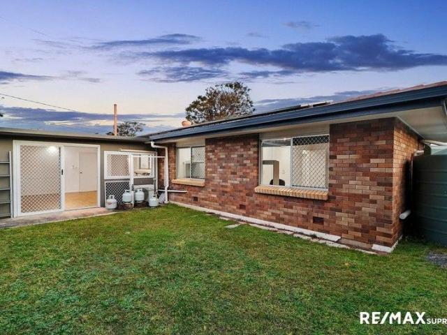 Spectacular Seven Bedroom Home with Dual Living or Business Potential!