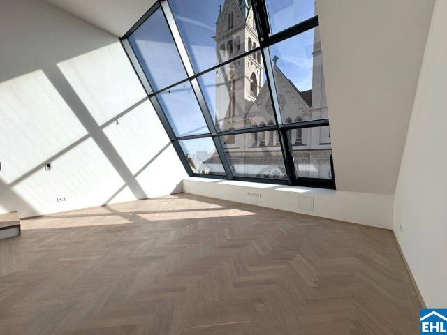 Spektakuläre Dachgeschoßmaisonette mit Terrassentraum und Blick auf die Canisiuskirche