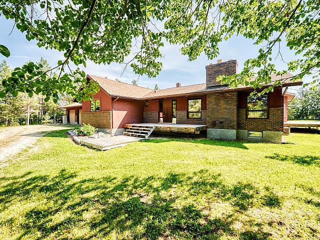 Sprawling Bungalow On Private Treed Lot