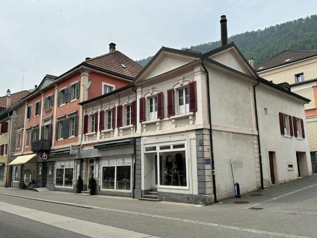 St Imier, immeuble comprenant un duplex, surface commerciale et garage