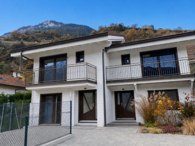 Standing Triplex récent avec terrasse et places de parc label minergie