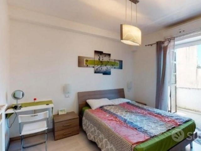 Stanza con bagno e balcone privato