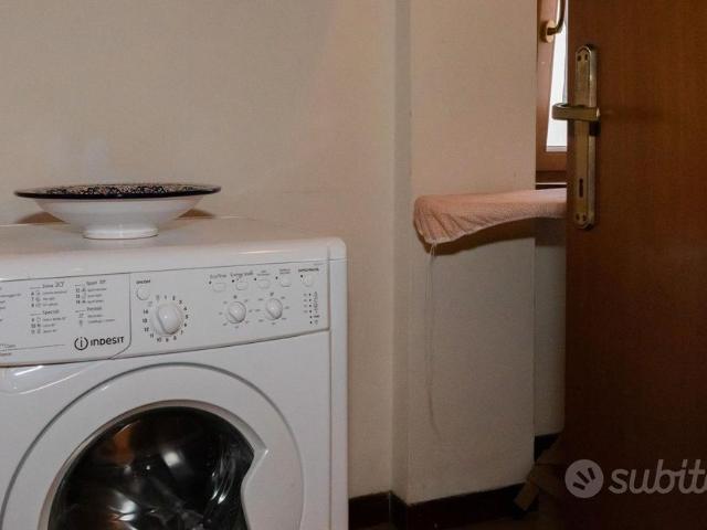 Stanza con letto matrimoniale e divano letto