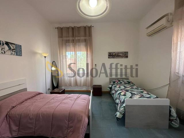 Stanza in appartamento in affitto a Latina