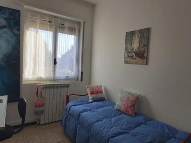 Stanza in appartamento in affitto a Melzo