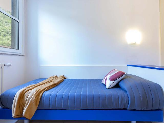 Stanza singola con bagno condiviso