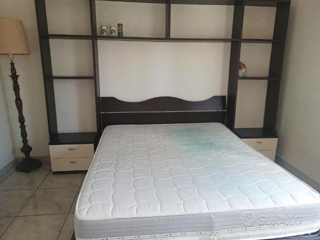 Stanza singola con letto matrimoniale