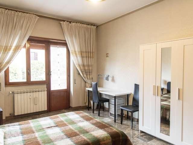 Stanze in affitto in un appartamento con 3 camere da letto a Roma