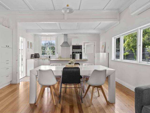 Step into a charming piece of history with this character home