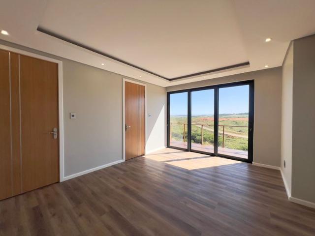 Step into luxury at this 4 bed, 4 bath, 1200 sqm masterpiece in Zimbali Lakes Resort!