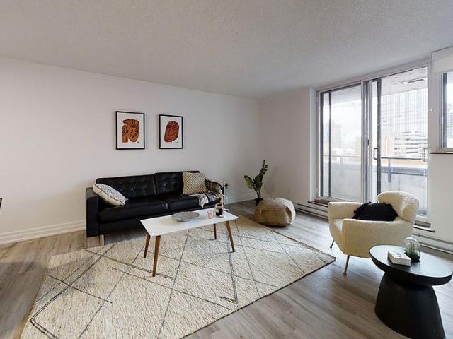 Steps to the Lyon O Train Station: Building amenities include a gym, party room, lounge, and rooftop patio