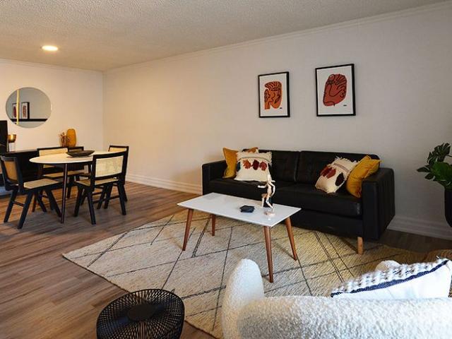 Steps to the Lyon O Train Station: Building amenities include a gym, party room, lounge, and rooftop patio