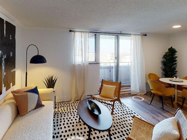 Steps to the Lyon O Train Station: Building amenities include a gym, party room, lounge, and rooftop patio