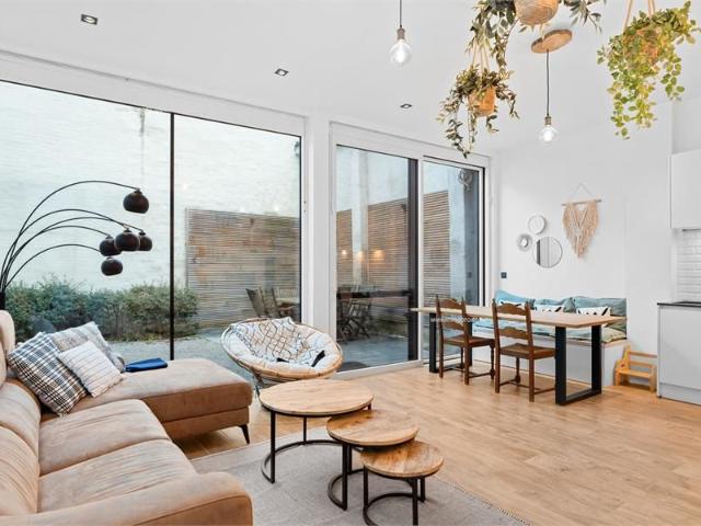 Stijlvol vernieuwd appartement met stadstuin in hartje Gent