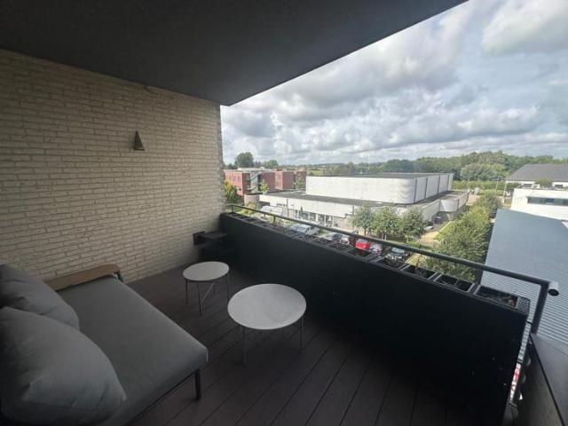 Stijlvol en lichtrijk appartement met twee terrassen en open