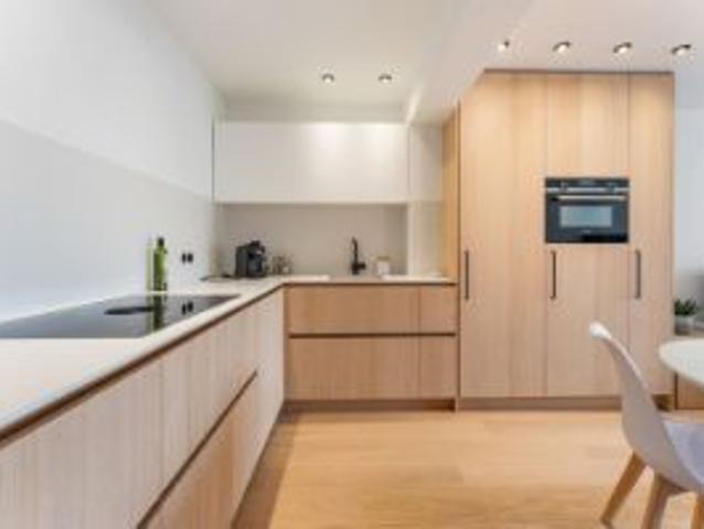Stijlvol gerenoveerd appartement met twee slaapkamers in Si