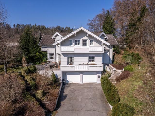Stilvoll wohnen mit Seeblick, Garten, Balkon und Doppelgarage in Krumpendorf