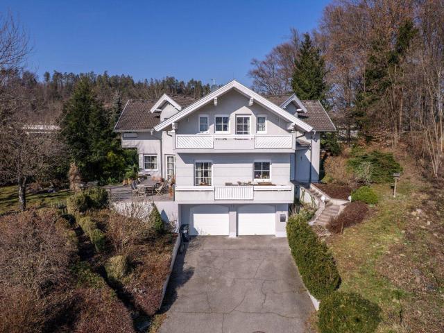 Stilvoll wohnen mit Seeblick, Garten, Balkon und Doppelgarage in Krumpendorf
