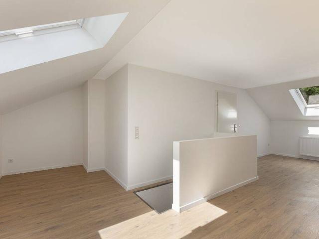 Stilvoll sanierte 3 Zimmer Wohnung zuzüglich wohnlich ausgebauter Nutzfläche im Spitzboden
