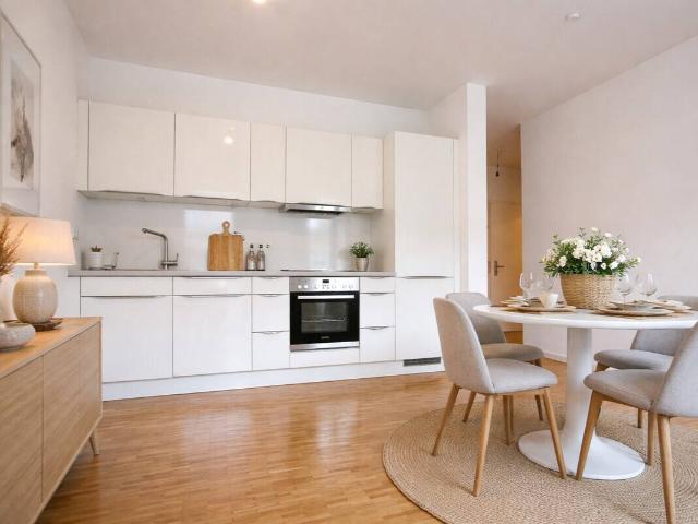 Stilvolle 2 Zimmer Wohnung mit Balkon, Fußbodenheizung und Aufzug