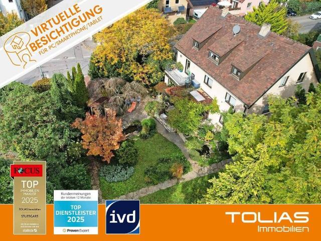 Stilvolles Mehrgenerationenhaus mit 3 Wohneinheiten, Weinkeller und Traumhaften Garten