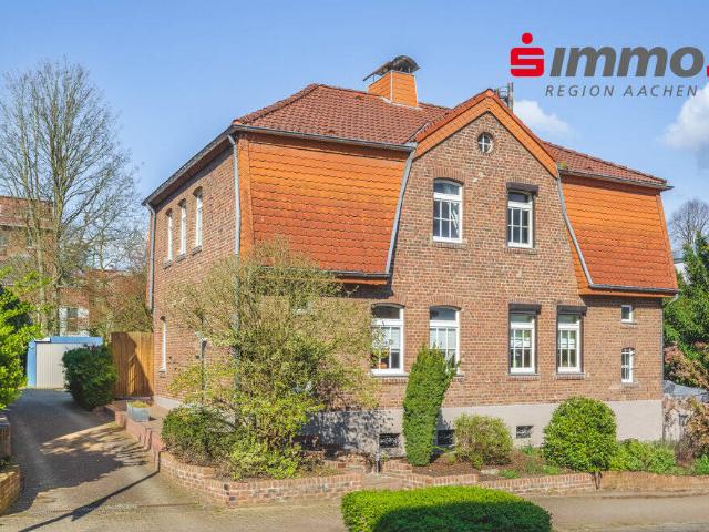 Stilvolles Einfamilienhaus mit Sonnengarten und Garage