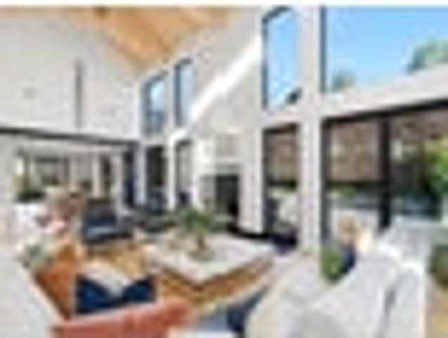 Streamside Sophistication in Prestigious Location