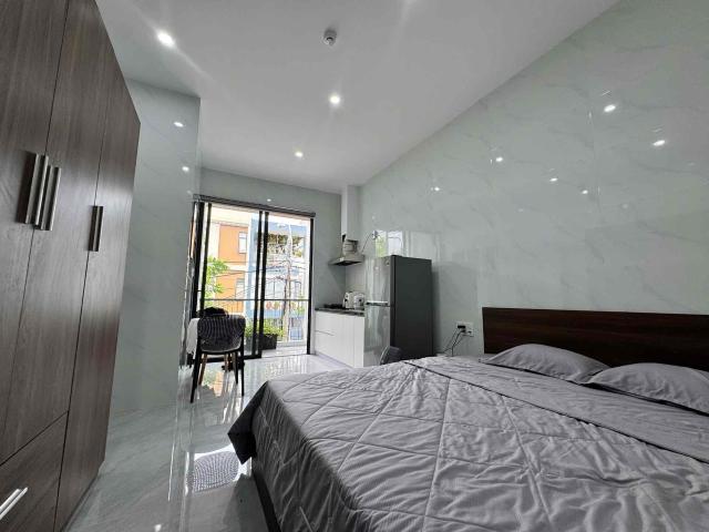 STUDIO APARTMENT WITH PRIVATE BALCONY TRINH LOI STREET NAM VIET A AREA