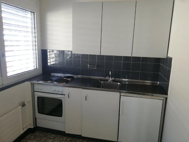 Studio dans un immeuble avec ascenseur