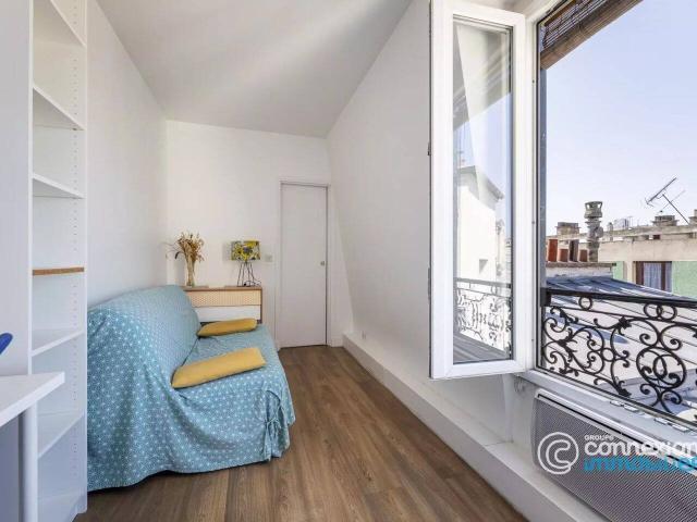 STUDIO DERNIER ETAGE SUD VUE TOUR EIFFEL