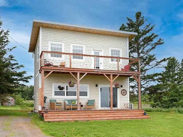 Stunning View Of North Rustico Harbour Year Round Home