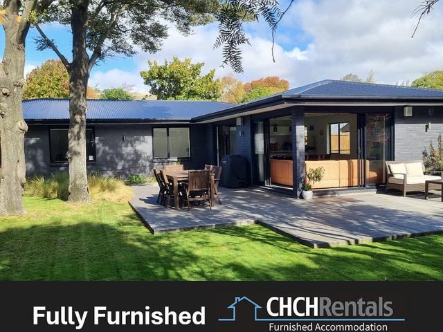 STUNNING FULLY FURNISHED MODERN HOME ON LARGE FAMILY SIZED SECTION!
