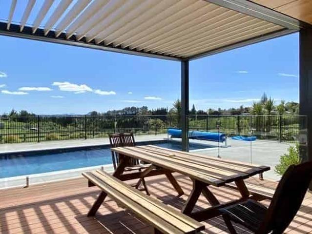 Stunning semi rural family home with Separate Sleepout, Triple Garage & Grazing Potential