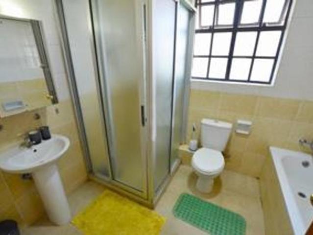 Stunning secure 4 bedroom townhouse plus family rm and dsq with common pool and 24hrs security